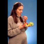 ImaNutrition in pregnancy pregnant woman eating strawberries grapesge from pixnio.com