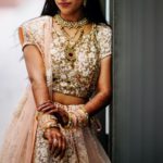 A picture containing clothing, person, indoor, dress Description automatically generated