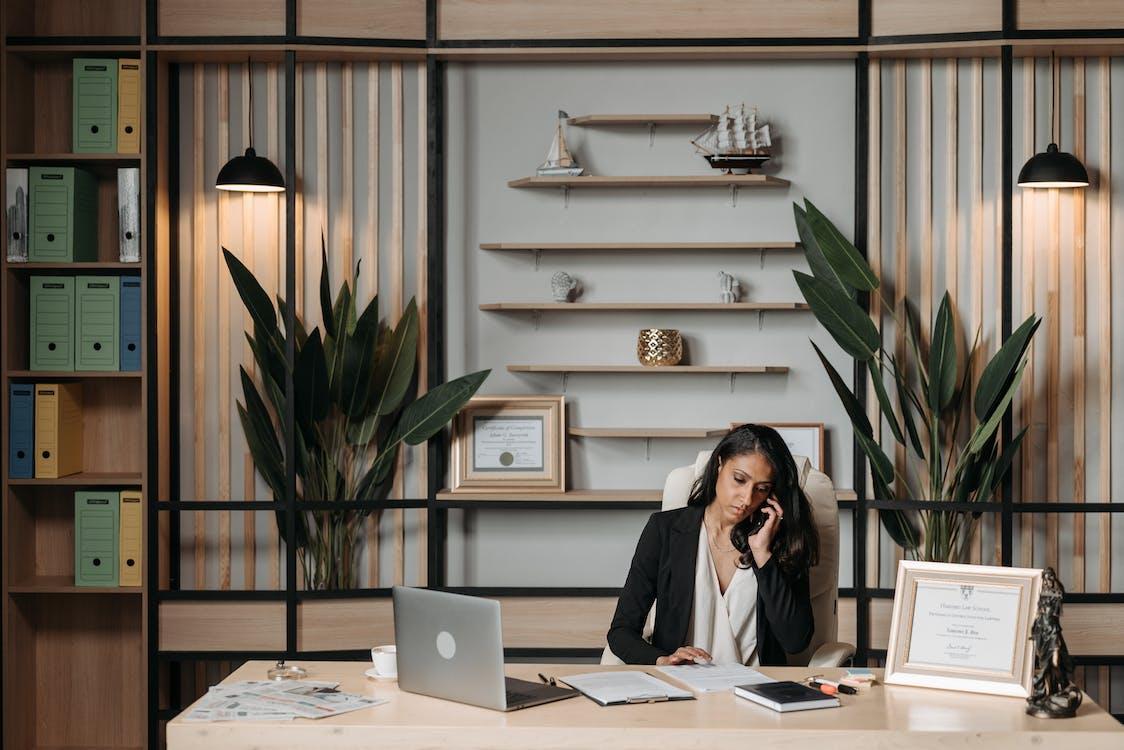 Free Woman Working at the Desk in Office Stock Photo